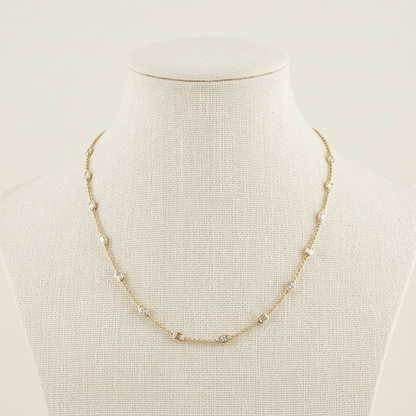 THE STATION NECKLACE IN MARQUISE AND EMERALDS
