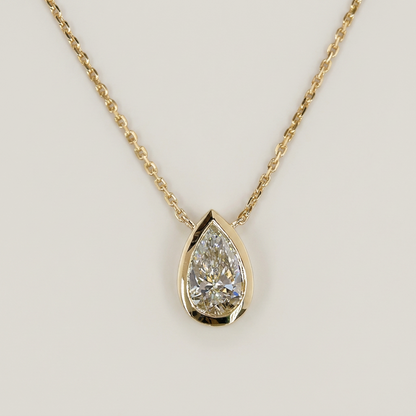 1.00 CTW BEZEL PEAR PENDANT