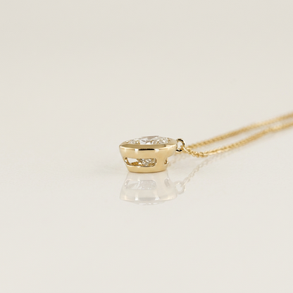 1.00 CTW BEZEL PEAR PENDANT