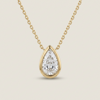 1.00 CTW BEZEL PEAR PENDANT